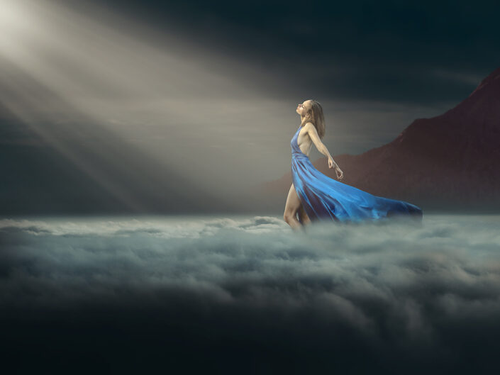 Woman walking in the clouds